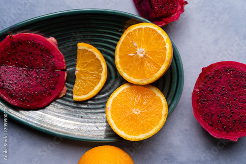 Fresh Dragon Fruit and Orange Slices on Decorative Plate