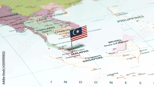 3D Map Pointer with Malaysia National Flag Dropping on World Map, Travel Destination Concept