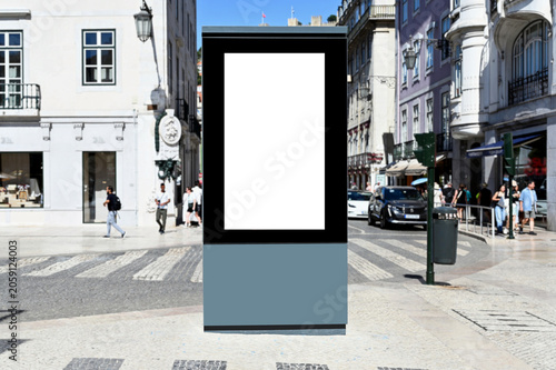 blank digital ad panel. billboard display. empty white lightbox sign. popular shopping street and square in Lisbon. mockup template. city transit station. european street setting. outdoor advertising.
