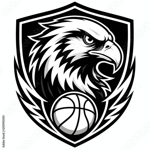 A fierce eagle head emblem above a basketball, designed for a sports team logo. The black and white illustration conveys strength and athleticism