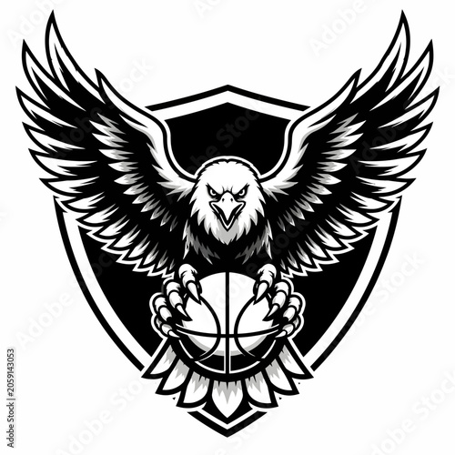An eagle mascot with outstretched wings clutching a basketball, set within a shield emblem