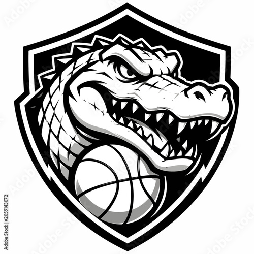 A fierce alligator mascot logo holding a basketball, framed within a shield shape. The design is monochrome and features sharp details, conveying aggression and sportiness