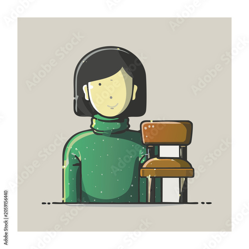 Woman in green sweater sitting at desk with chair