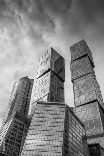 Moscow City skyscrapers under dramatic cloudy sky in Moscow, Russia