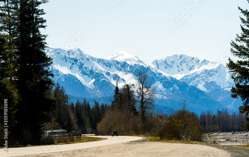 Scenic Road to Snow-Capped Peaks