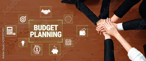 Canvas Print Collaborative Budget Planning Session with Hands on Table Surrounded by Financial Icons and Graphics for Effective Money Management Strategy Fluxor