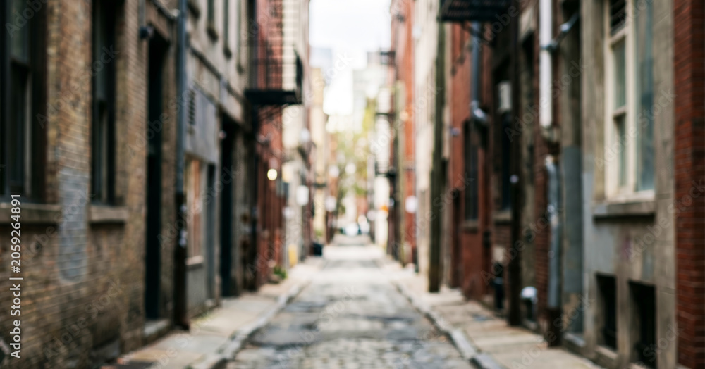Fototapeta premium Blurred urban alley pathway