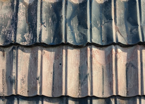 Detailed Close Up Of Weathered Corrugated Metal Roofing Panels Featuring Distressed Textures And Uneven Faded Paint Surfaces For abstract Architectural Design