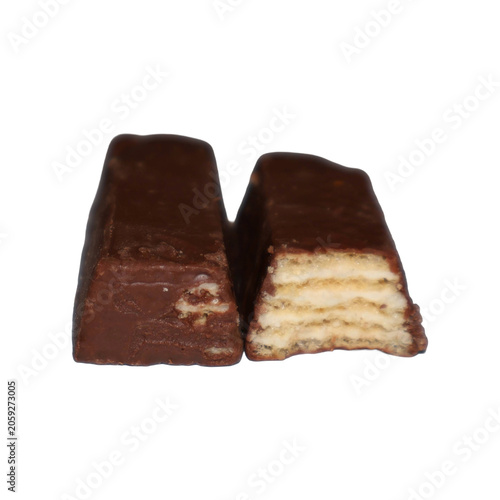 Wafer chocolate confection cut in half showing layered interior texture during studio shoot