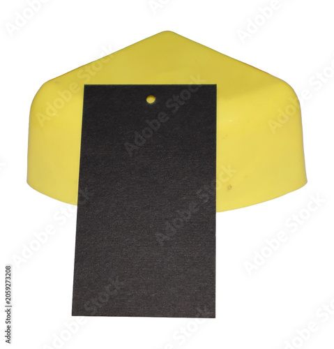Yellow corner protector with blank black tag for labeling during shipping or inventory