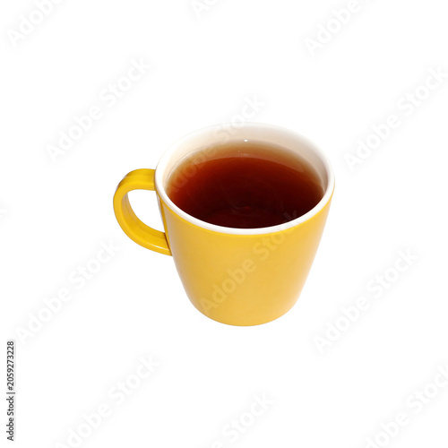 Yellow mug with hot tea during morning relaxation and quiet contemplation