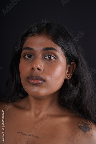 Close-Up Portrait of Dusky-Toned Woman with Natural Beauty