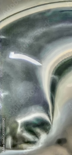 A very close up of water going down a drain while in motion for an abstract shot