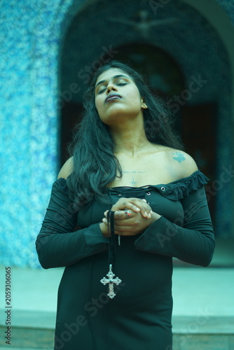 Gothic Model in Church with Cross Background