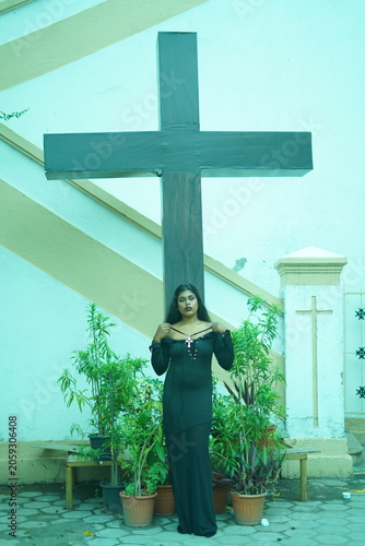 Gothic Model in Church with Cross Background