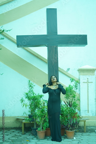 Gothic Model in Church with Cross Background