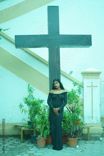 Gothic Model in Church with Cross Background