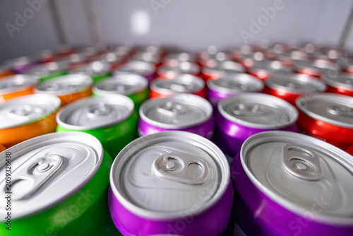 Fotografie Colorful aluminum can beverage drink refreshment metallic closeup row pattern sh