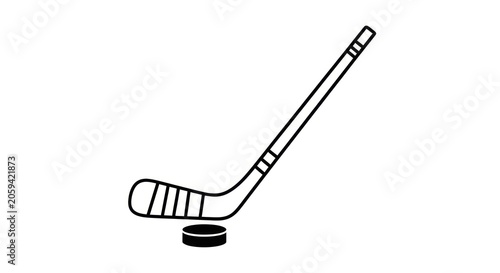 Black silhouette icon of hockey stick and puck