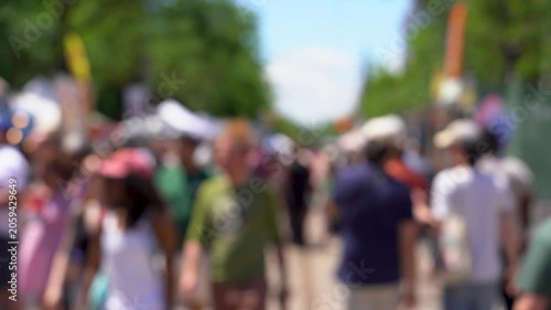 Blurred view of crowded people at a street festival 4K