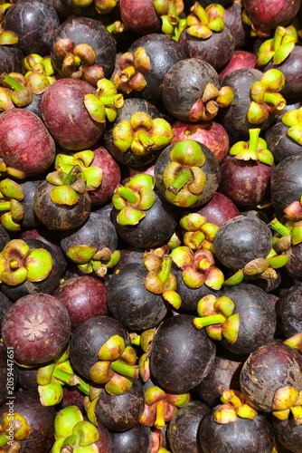 Close up of fresh ripe mangosteen fruits for background