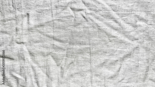 Photos wrinkled white linen fabric texture creates an organic abstract background patte