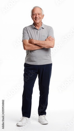 Confident Smiling Senior Standing With Arms Crossed Isolated on White Background