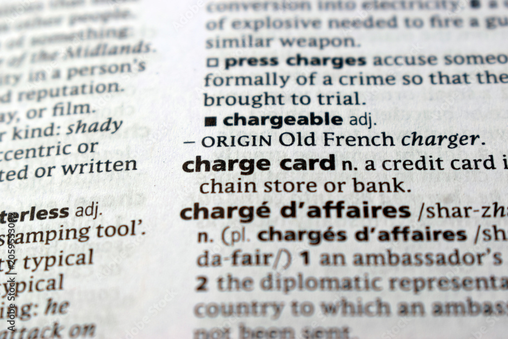 Fototapeta premium Close Up Of English Explanation Dictionary Page Word Of - charge card