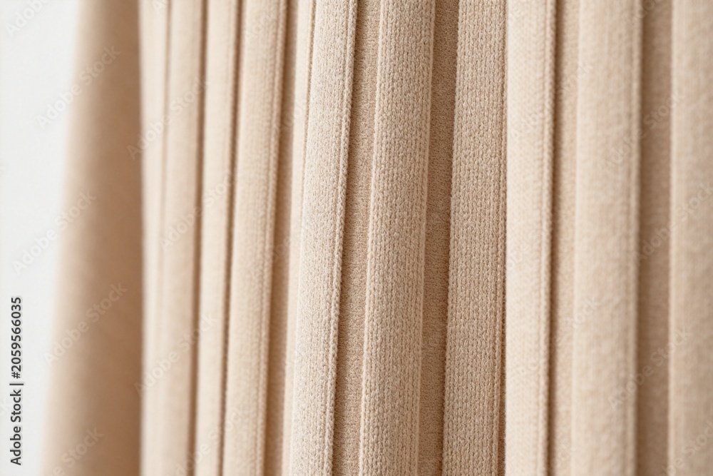 Obraz premium Close-up of Beige Pleated Curtains in Soft Lighting