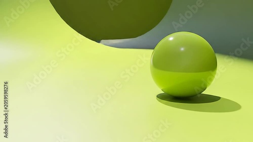 Glossy green sphere on green surface with soft shadow and copy space