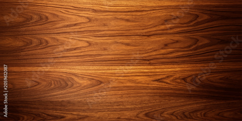 Fotografía A close-up shot showcases the rich texture and warm tones of a polished wooden surface, highlighting the natural grain patterns and smooth finish