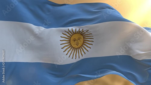 Argentina national flag waving in the wind with golden sunlight background for patriotic celebration
