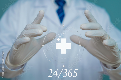 octors are using a virtual healthcare system marked with a medical cross symbol. This concept encompasses telemedicine, digital health, online consultations, patient care, and 24/7 medical services.