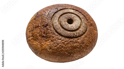 Close-up of a single rustic sourdough bread loaf with a spiral score on top whole wheat round bread scoring baked goods food photography food styling bakery product bread making