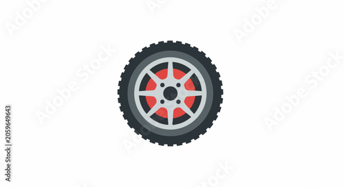 A dark-treaded vehicle wheel with a silver alloy rim and red accents is centered