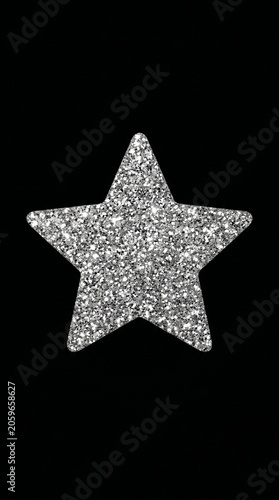 silver star on black background