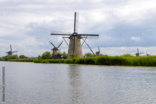 The famous windmills of Kinderdijk, in the Netherlands. The site is home to 19 historic 18th-century mills, lined along the canals. It is a UNESCO World Heritage site, famous for its water management 