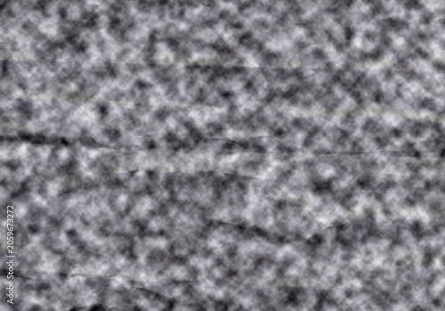 Crumpled paper texture with gray tones and visible creases a full frame photographic detail grey wrinkled surface