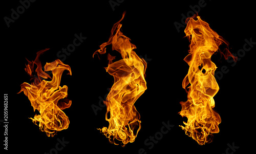 Fotografie Abstract fire flames isolated on black background with glowing orange and yellow blaze