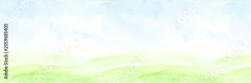 Panel kuchenny z motywem A summer landscape with hills under a blue sky and white clouds. Horizontal seamless border, drawing of meadows and fields, Watercolor illustration. View of green grass and bushes