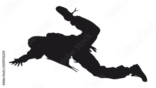 Konstfotografi Dancer performs a dynamic breakdance move against a plain white background