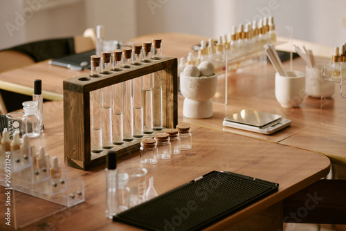 Bild auf Leinwand Close up of fragrance lab tools supporting perfume blending and product formulation on worktable