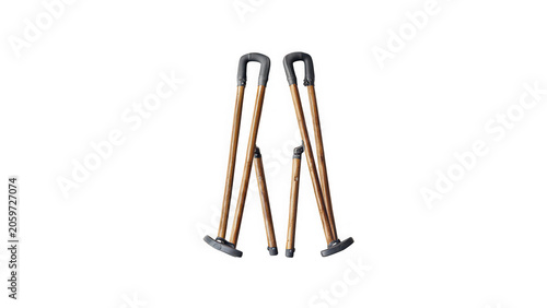 Wooden crutches with black rubber tips and handles on transparent background