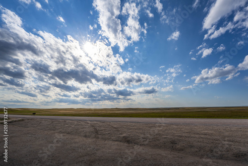Badlands Canyon Landscape Under Dramatic Cloudy Sky in Badlands NP, South Dakota