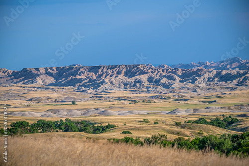 Badlands Canyon Landscape Under Dramatic Cloudy Sky in Badlands NP, South Dakota