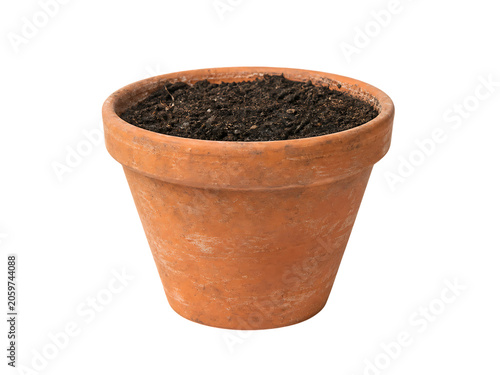Terracotta flower pot filled with soil, isolated on transparent background, gardening concept