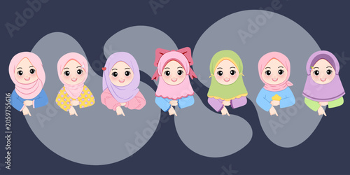 set of muslim kids in hijab directing their finger