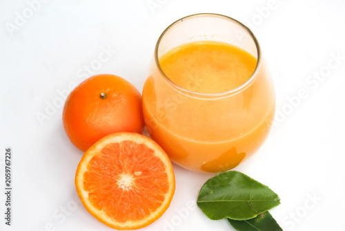 Obraz na plátne top view of a glass of orange juice isolated on a white background