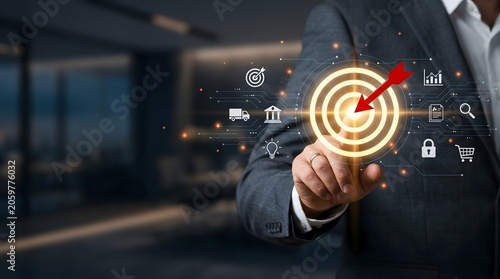 Businessman touching glowing target with red arrow, digital business icons