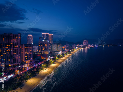 Fényképezés Aerial view night cityscape of Nha Trang city and embankment of Sea Vietnam